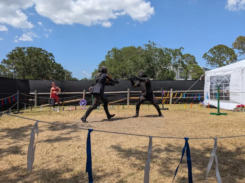 Steel Ring Academy students Billy and Seth fighting with longswords at the St Peterburg Renaissance Faire.