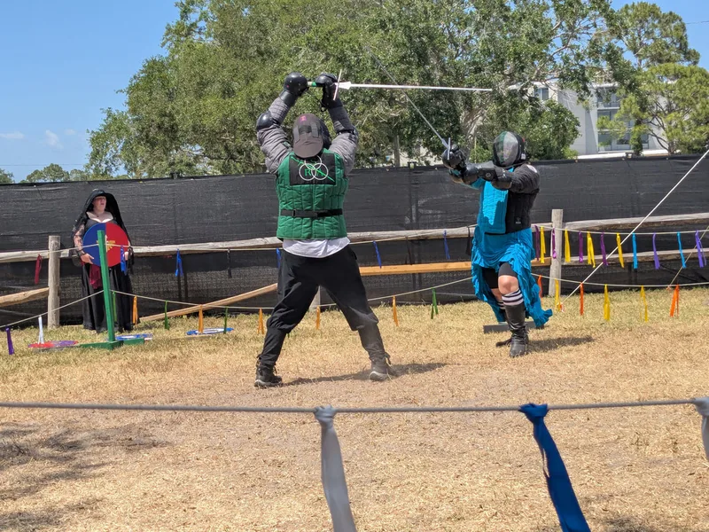 Steel Ring Academy students Garrison and Peach fighting with longswords at the St Peterburg Renaissance Faire.