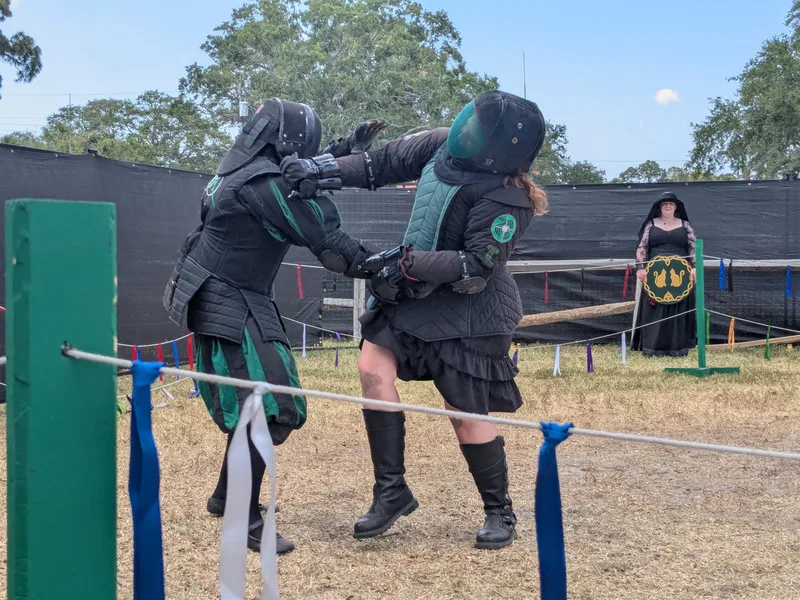 Steel Ring Academy instructors Chris and Amanda fighting with daggers at the St Peterburg Renaissance Faire.