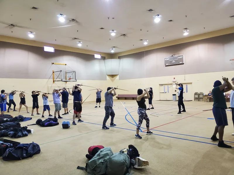 Instructors leading students through longsword stances.
