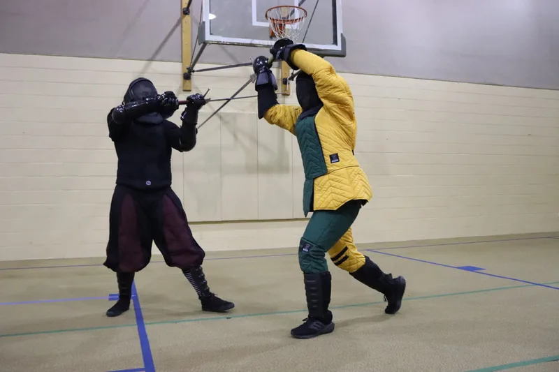 Avery and Nathan in a longsword bind.