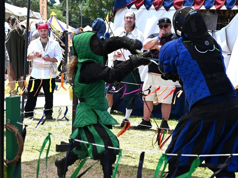 Student Asher and Instructor Ryan fight Longsword in the Ring