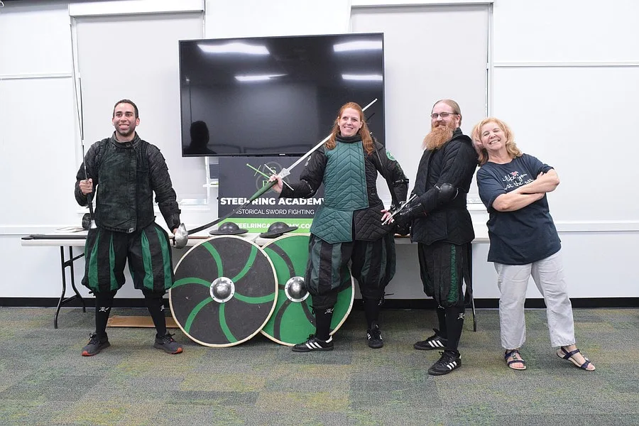 Steel Ring Instructors with Braden River Library staff prior to a Summer Reading Program demonstration.