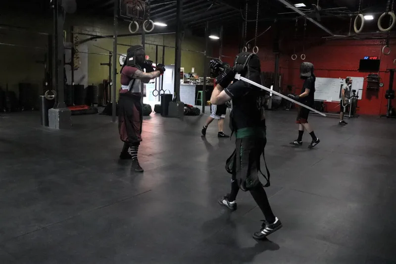 Avery and Jason preparing to spar with longswords.