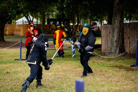 Instructor Jason and Student Brandon engaged in a longsword duel at the Suncoast Renaissance Faire in 2021.