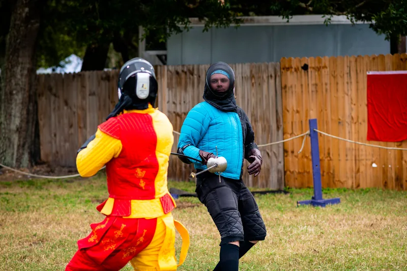 Steel Ring Academy rapier specialists fighting in the ring at the Suncoast Renaissance Festival.