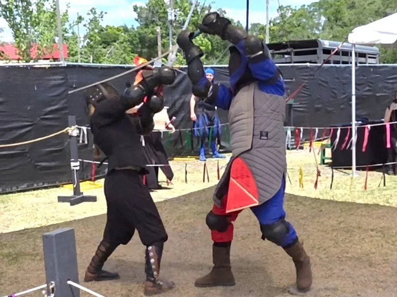 Students Garrison and Delaney fight Longsword in the Ring
