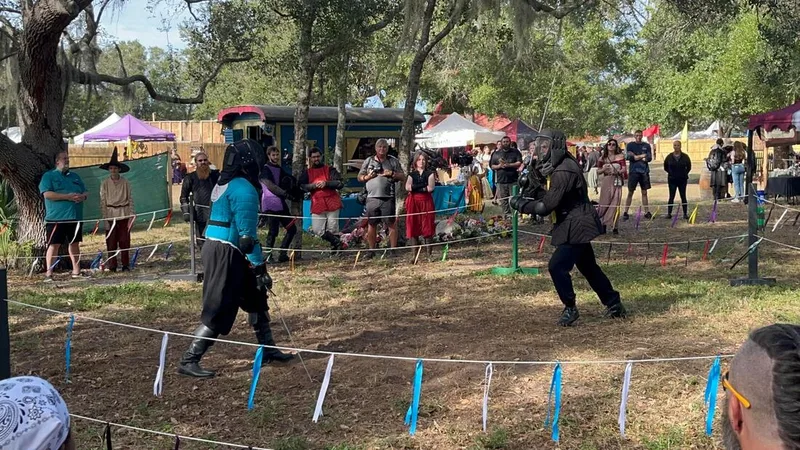 Steel RIng Academy Instructor Ryan and student Seth sparring with longswords at the Suncoast Renaissance Festival.